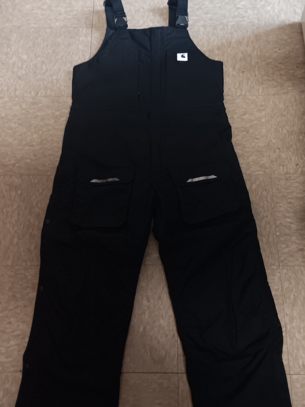 Carhartt Yukon Extreme Black Quilted Insulated Bibs.
